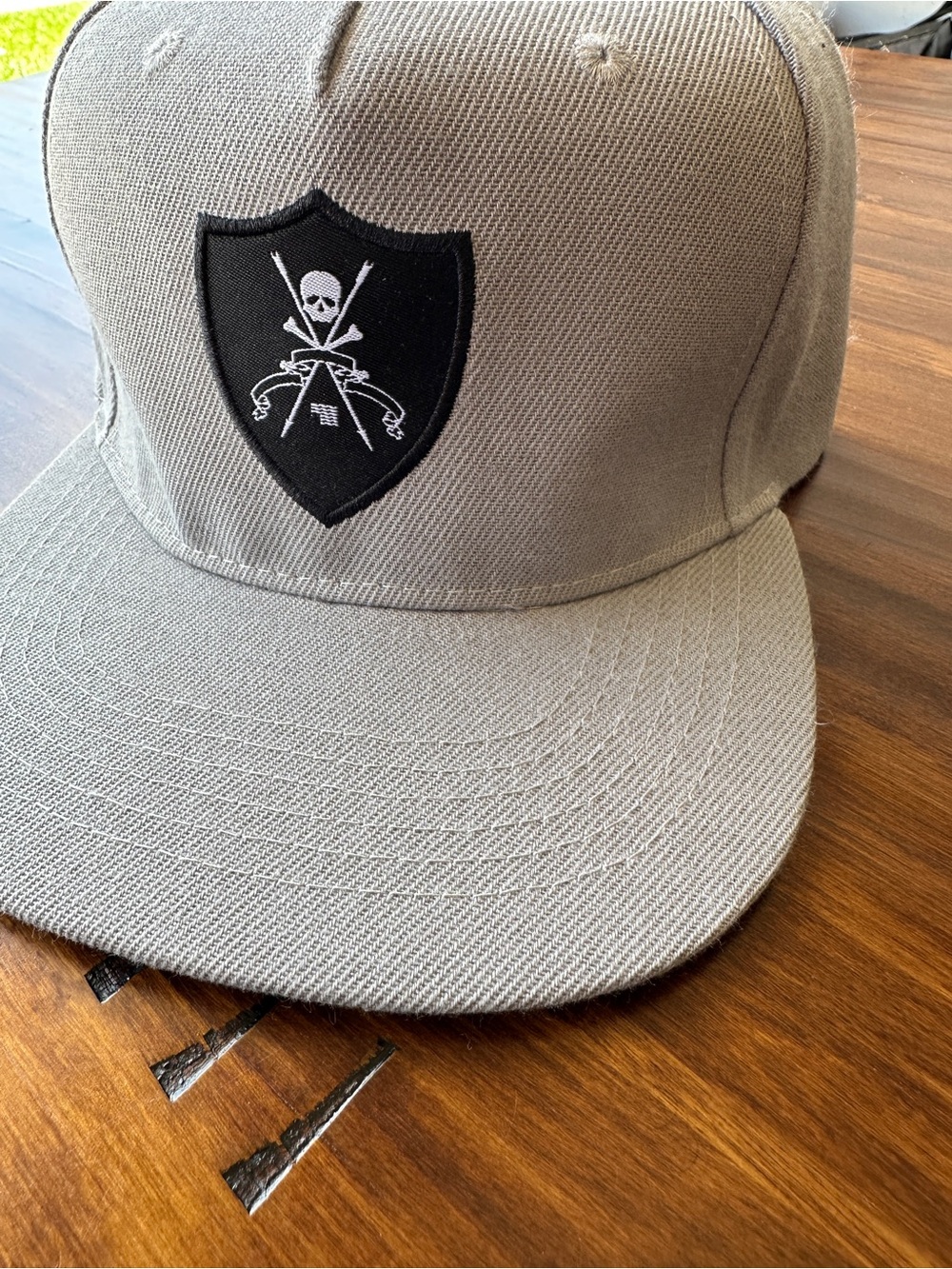 Black Scale Grey Snapback Hat with Black & White Skull Shield Patch